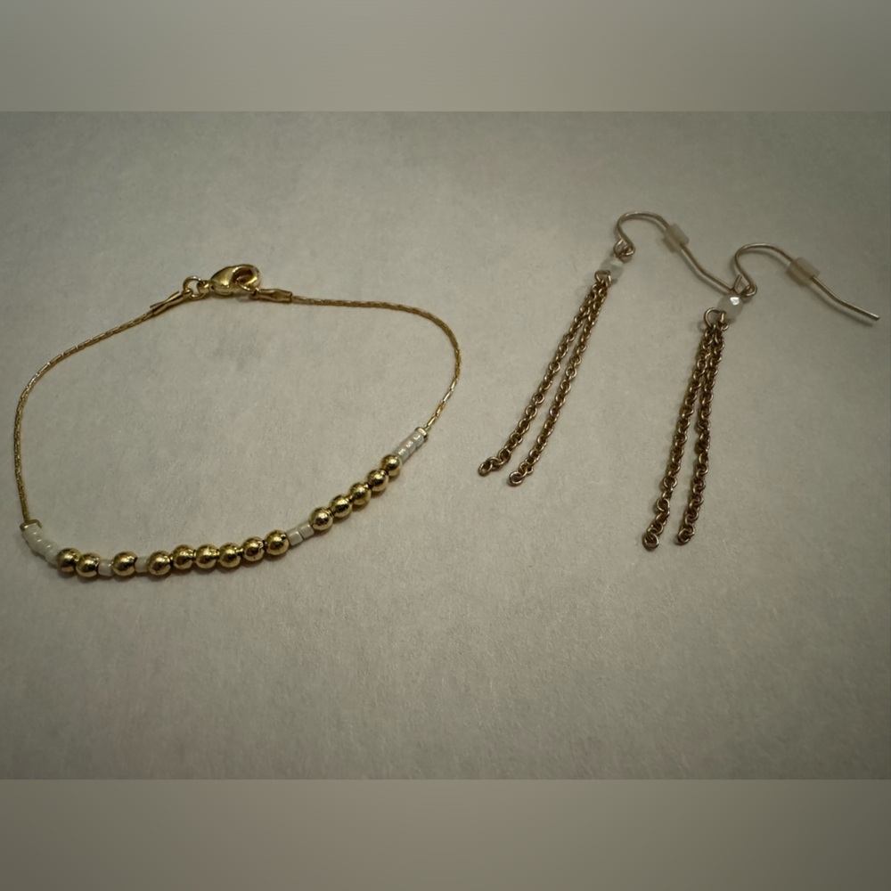 Dainty Gold Toned bracelet and earrings